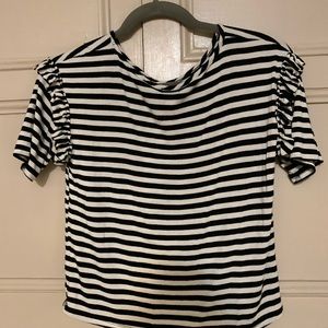 Black and white striped blouse with ruffle sleeve.